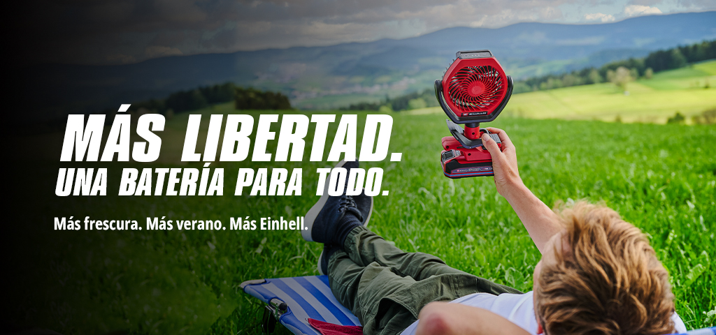 Imagen de un hombre tumbado en la hierba con un abanico en la mano y, a la izquierda, el texto. "MÁS LIBERTAD. UNA BATERÁ PARA TODO. Más frescura. Más verano. Más Einhell."